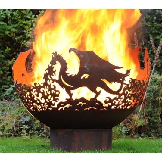 outdoor dragon style fire bowl with large flames during day