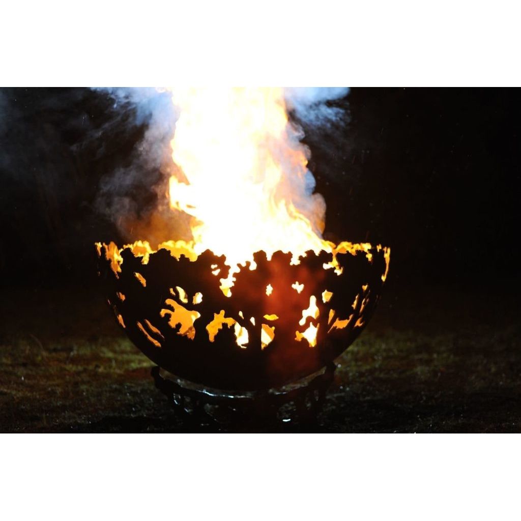 forest fire bowl at night in garden with large flames