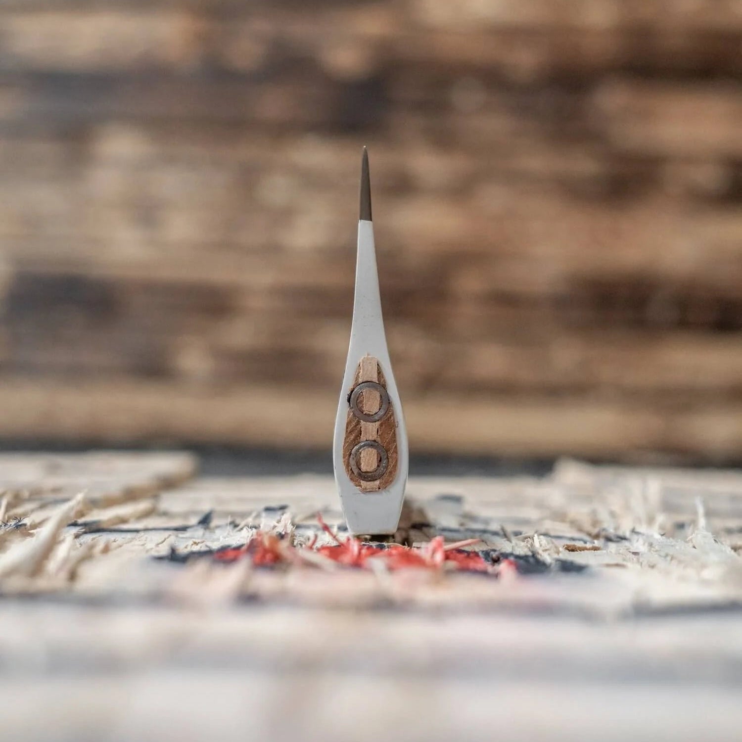 Decorative item with number '8' on a wooden surface