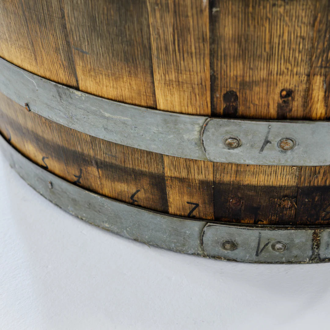 bottom of cold plunge wooden barrell