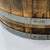bottom of cold plunge wooden barrell