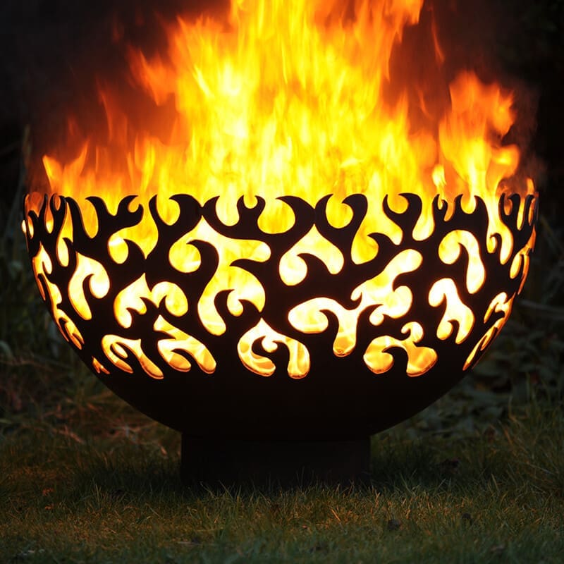 large fire flame bowl outdoors with lagrge flames at night