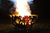 forest fire bowl at night in garden with large flames