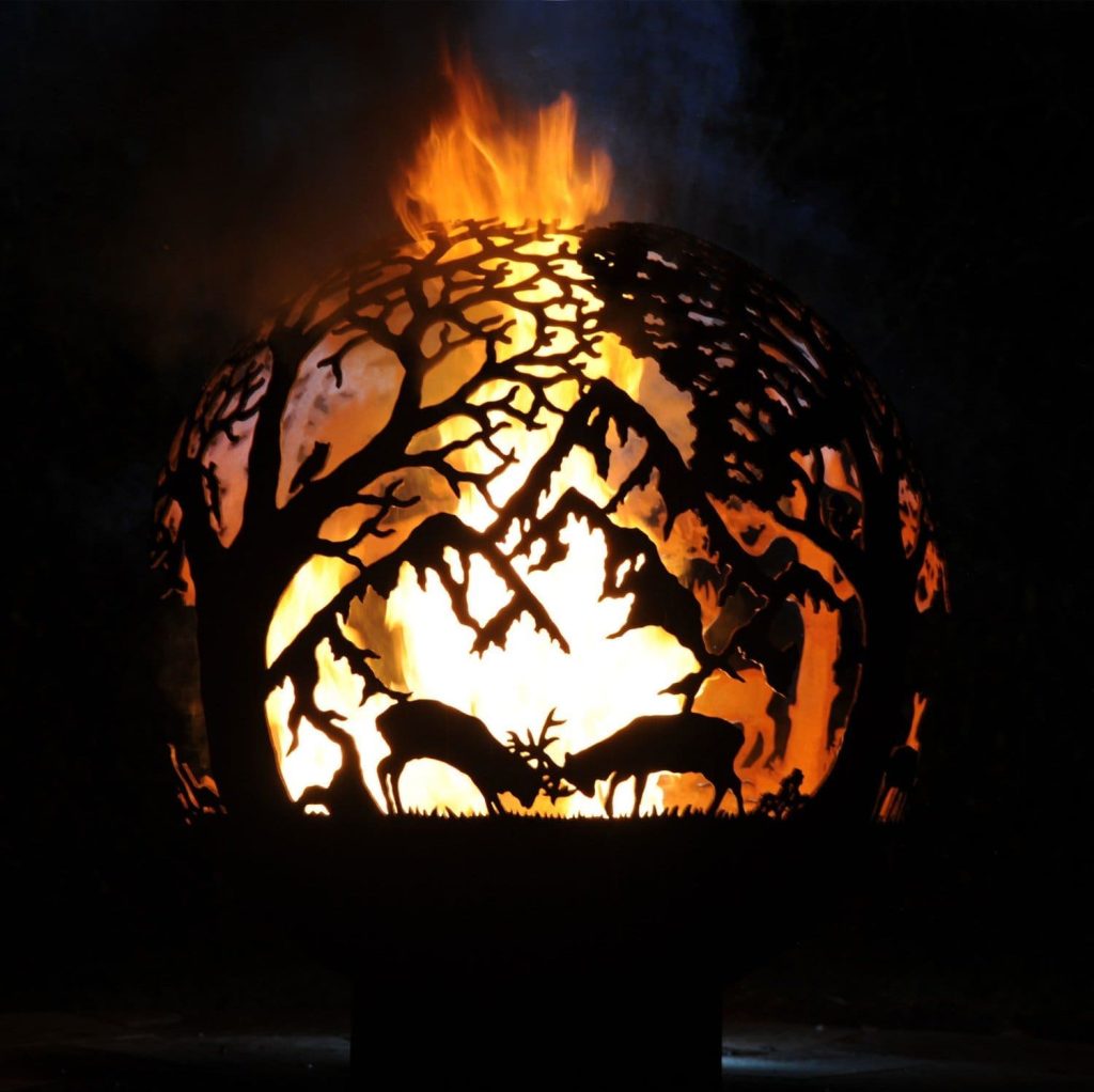 highland detailed fire bowl at night with large flames