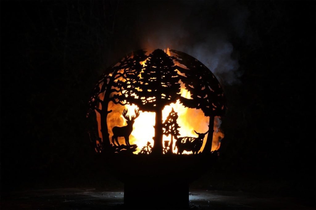 highland detailed fire bowl with deers at night