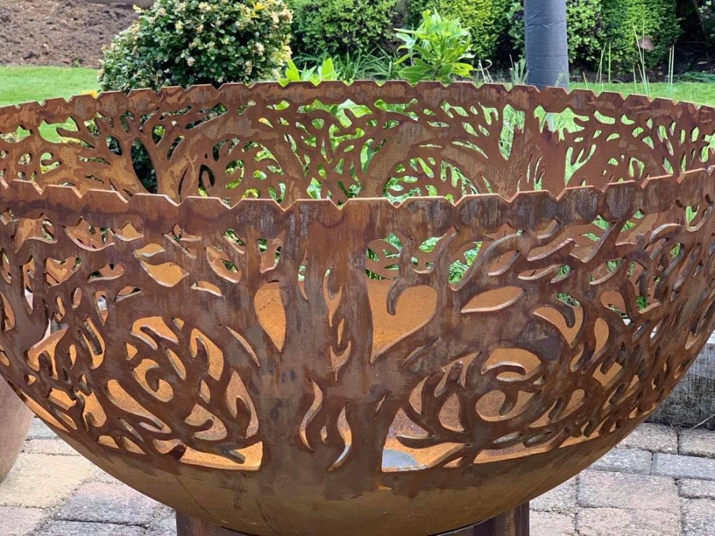upclose view of twisted tree fire bowl details