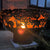 small fire in elephant fire bowl at night
