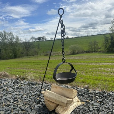 "Netherton Foundry stake driven into soil beside live fire setup